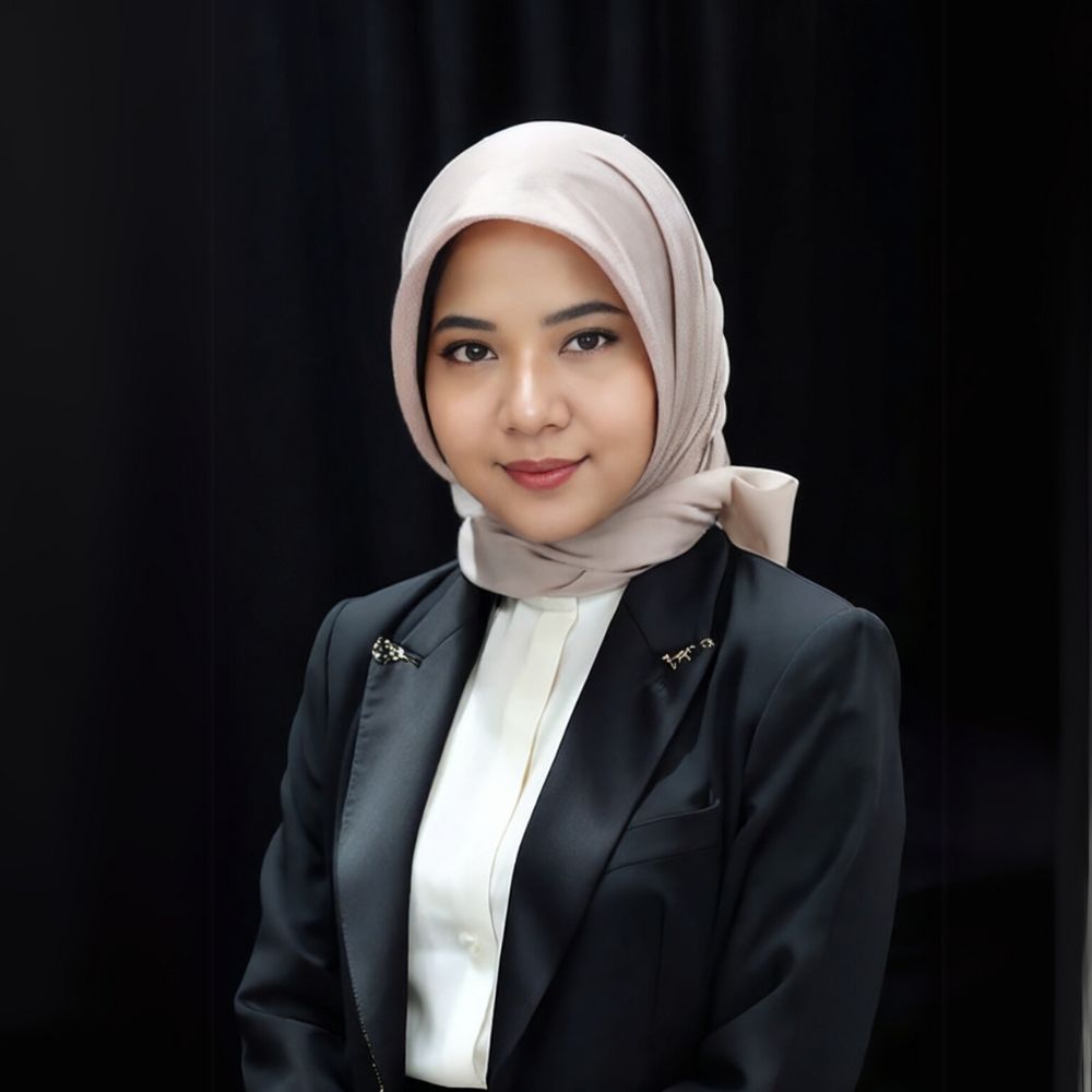 Rizqi Aulia Diyani - Professional headshot of a research analyst and project manager